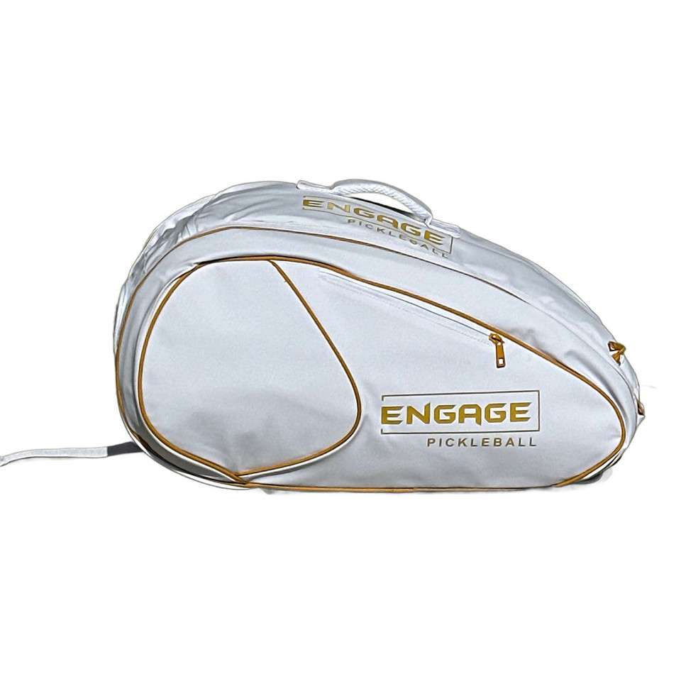 A white oval gear bag has a shoulder strap and a side zipper.