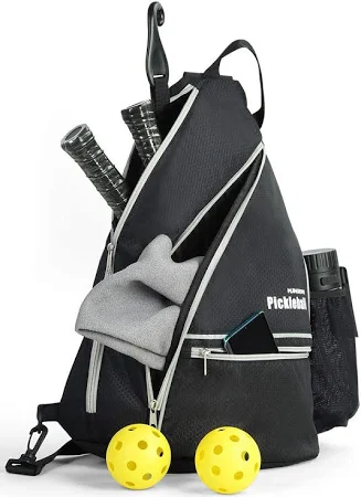 A black sling-style paddle bag holds paddles and two yellow balls.