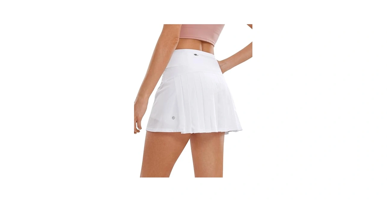 A white pleated sports skirt has a high waistband.