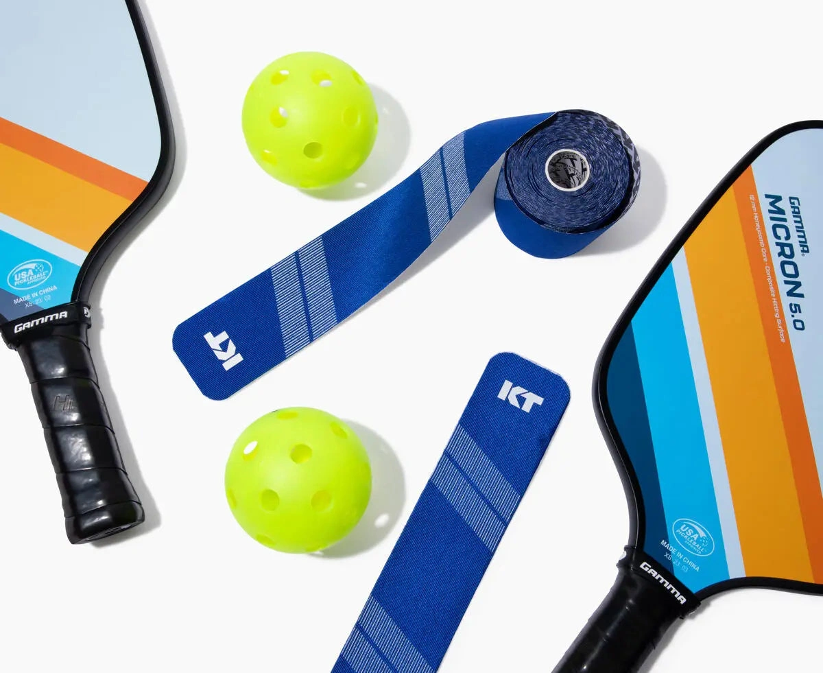 Kinesiology tape applied to a player's arm for recovery.