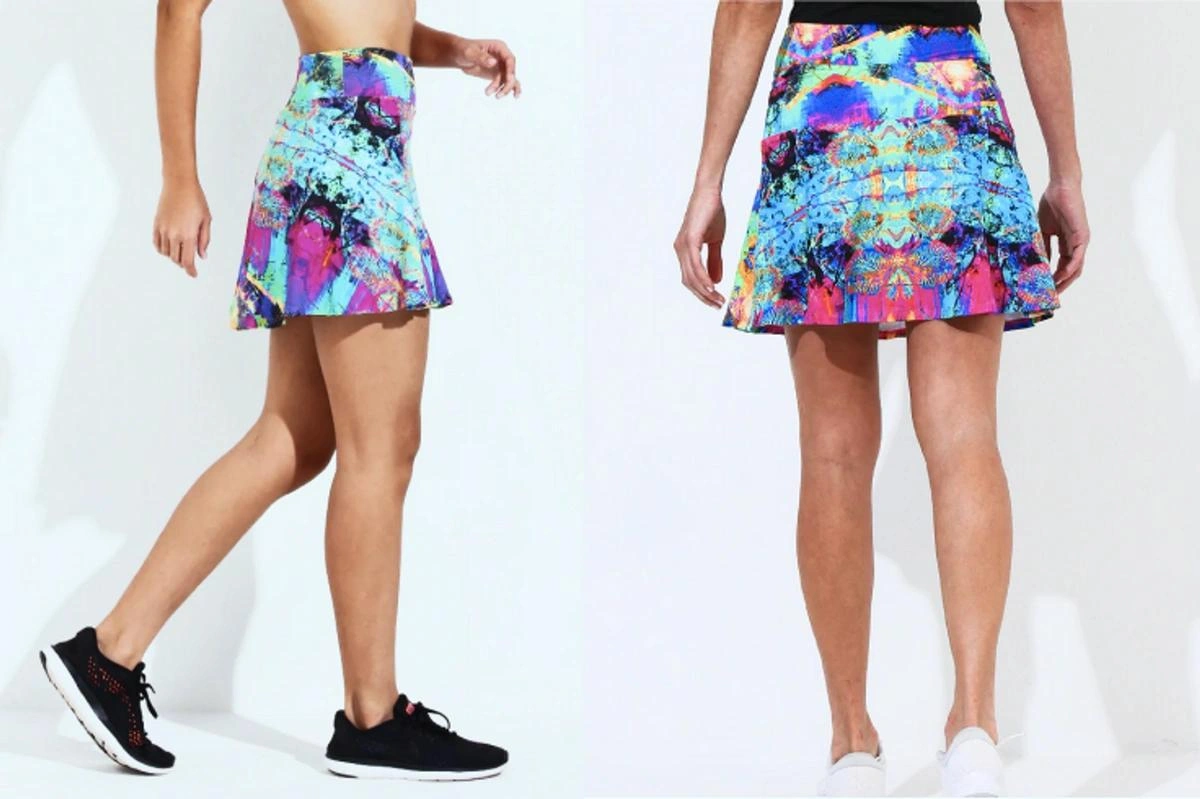 Front and back views show a brightly printed athletic skirt.